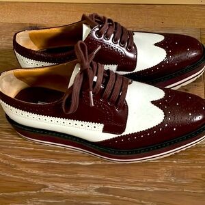 Burgundy and white Prada shoes in very good used condition